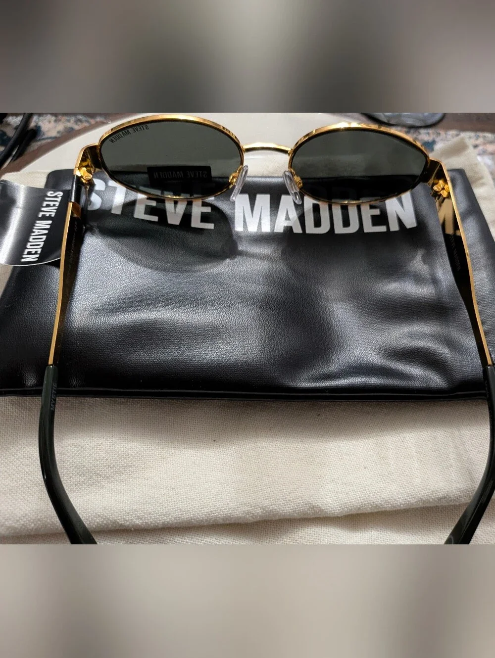 Steve Madden Gold Oval Sunglasses with Black Lenses